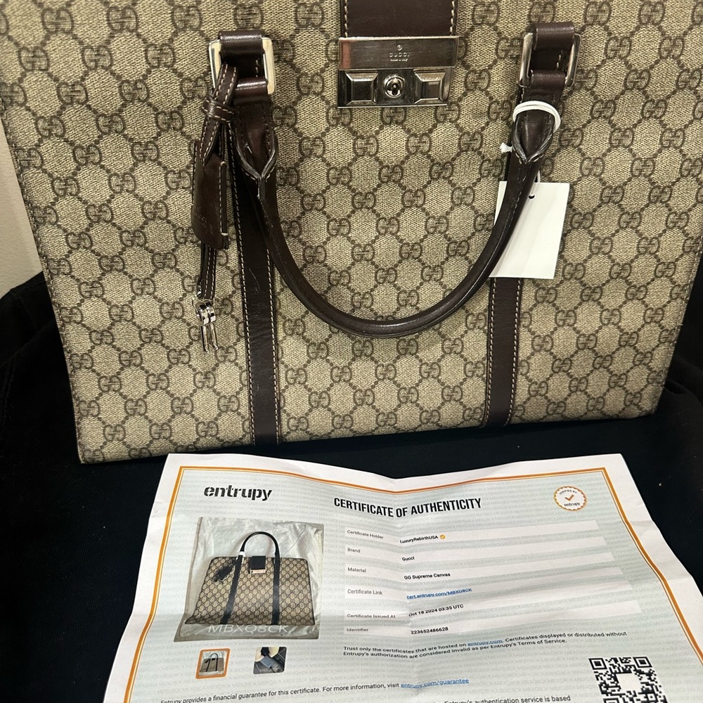 Gucci Brown Laptop Bag with Monogram Pattern and Leather Trim